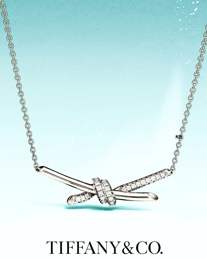 TIFFANY KNOT PENDANT IN SILVER WITH DIAMONDS