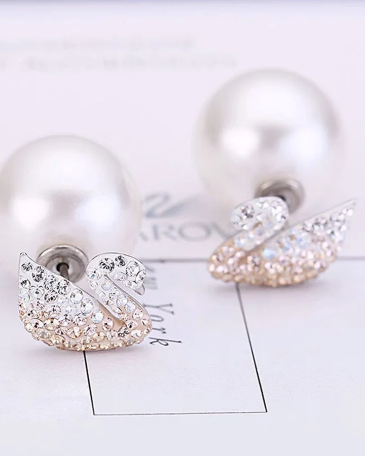 Swarovski Iconic swan stud earning